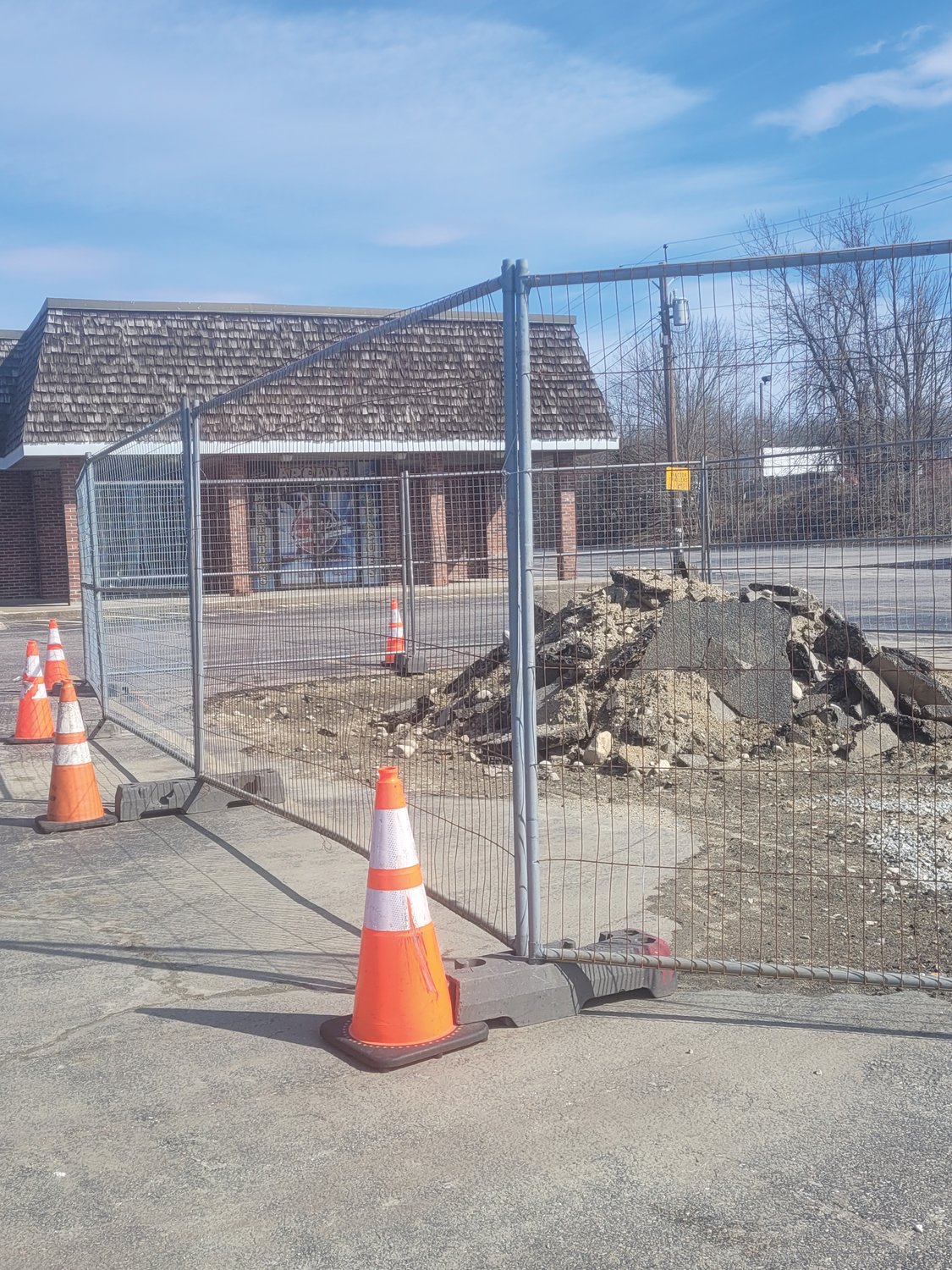 WATER WORKS: An employee at Town Hall lanes said the bowling alley will be without water for months as they construct a new bank branch building along Atwood Avenue. Because of the utility work, the bowling alley will shut its doors forever in a few weeks.